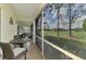 Outdoor patio with seating and a view of the golf course and blue skies at 6546 Fairway Gardens Dr # 6546, Bradenton, FL 34203