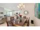 Bright dining area flows into the kitchen and living space, creating an inviting atmosphere at 6721 Oak Manor Dr, Lakewood Ranch, FL 34202