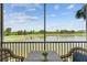Enjoy gorgeous views from this screened-in lanai with seating and a great view of the lake and the golf course at 7005 River Hammock Dr # 203, Bradenton, FL 34212