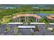 Beautiful condo with well-kept covered parking, landscaping and a view of the lake and surrounding nature preserve at 7005 River Hammock Dr # 203, Bradenton, FL 34212