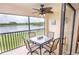 Relax and enjoy the waterfront view from the screened lanai, perfect for outdoor dining and relaxation at 7235 River Hammock Dr # 204, Bradenton, FL 34212