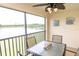 Comfortable lanai setup with water view, ideal for enjoying the scenery at 7235 River Hammock Dr # 204, Bradenton, FL 34212