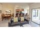 Open floor plan seamlessly connects living room, kitchen, and dining area, creating an ideal space for entertaining at 7235 River Hammock Dr # 204, Bradenton, FL 34212