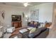 Cozy living room is decorated with comfortable furniture and a ceiling fan, providing a relaxing atmosphere at 7235 River Hammock Dr # 204, Bradenton, FL 34212