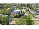 Waterfront home featuring backyard boat access, lush greenery, and water views at 7308 Maryland Ave, Hudson, FL 34667