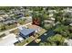 Waterfront home featuring backyard boat access, yard, and lush greenery at 7308 Maryland Ave, Hudson, FL 34667