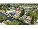 Waterfront home featuring backyard boat access, lush greenery, and parking at 7308 Maryland Ave, Hudson, FL 34667