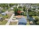 Waterfront home featuring backyard boat access and driveway with pickup truck parking at 7308 Maryland Ave, Hudson, FL 34667
