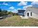 Spacious backyard with a patio area, perfect for outdoor entertaining and enjoying waterfront views at 7308 Maryland Ave, Hudson, FL 34667