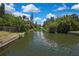 Beautiful view of the canal with lush greenery, offering a peaceful and scenic setting at 7308 Maryland Ave, Hudson, FL 34667