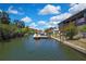 Picturesque waterfront scene of the canal, showcasing the home's idyllic location and boat dock at 7308 Maryland Ave, Hudson, FL 34667