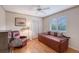 Cozy bedroom with hardwood floors, a daybed, and closet at 766 Shadow Bay Way, Osprey, FL 34229