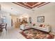 An open-concept living space with stylish decor and seamless flow into the kitchen and dining areas at 766 Shadow Bay Way, Osprey, FL 34229