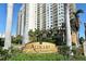 A view of the Alinari high-rise building with fountains and landscaping in downtown Sarasota, Florida at 800 N Tamiami Trl # 317, Sarasota, FL 34236