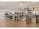 Well-equipped gym features modern weight machines, mirrored wall, and ample workout space at 800 N Tamiami Trl # 317, Sarasota, FL 34236