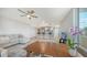 Inviting living space featuring an open layout, with a dining area, comfortable seating, and a serene view at 800 N Tamiami Trl # 317, Sarasota, FL 34236