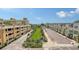 A beautiful street view with modern buildings, green space and a brick road at 800 N Tamiami Trl # 317, Sarasota, FL 34236