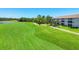 Gorgeous view of the condo from the golf course at 8755 Olde Hickory Ave # 7105, Sarasota, FL 34238