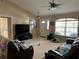 Cozy living room with plush seating, ample natural light, and a welcoming atmosphere at 10116 Reagan Dairy Trl, Bradenton, FL 34212