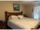 Serene bedroom featuring a comfortable bed, stylish decor, and soft, natural light at 10116 Reagan Dairy Trl, Bradenton, FL 34212