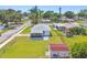 Charming home boasts a large yard, a screened patio, and a convenient storage shed at 1200 25Th W Ave, Palmetto, FL 34221