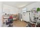 Unfinished garage with water heater and workbench provides space for storage and projects at 1200 25Th W Ave, Palmetto, FL 34221