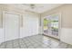 Bright living area with large windows and tile flooring provides a welcoming and airy atmosphere at 1200 25Th W Ave, Palmetto, FL 34221
