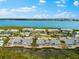 Inviting aerial view of waterfront condos featuring access to a serene pond and picturesque coastal views at 1312 Perico Point Cir, Bradenton, FL 34209