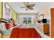 Bedroom with a bay window, shutters, dresser, and decor at 1312 Perico Point Cir, Bradenton, FL 34209