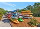 Kayaks neatly stored, ready for residents to enjoy waterfront activities at this lovely community at 1312 Perico Point Cir, Bradenton, FL 34209