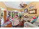 Inviting living room with hardwood floors and lots of natural light at 1312 Perico Point Cir, Bradenton, FL 34209