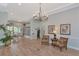 Inviting lobby featuring a chandelier, comfortable seating, and a view of the library at 1312 Perico Point Cir, Bradenton, FL 34209