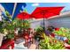 This beautiful patio offers an outdoor oasis with plenty of chairs, tables and shade for the perfect entertainment space at 1312 Perico Point Cir, Bradenton, FL 34209