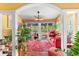 Bright sun room with plants, a large window, and comfortable furniture at 1312 Perico Point Cir, Bradenton, FL 34209