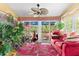 Bright sun room with plants, a large window, and indoor/outdoor living at 1312 Perico Point Cir, Bradenton, FL 34209