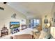 Inviting living area with modern furnishings and slider to outdoor lanai at 1314 57Th W St # 1314, Bradenton, FL 34209