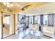 Sunroom with seating and natural light, perfect for relaxing or entertaining guests at 1314 57Th W St # 1314, Bradenton, FL 34209