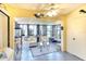Sun room with ample natural light, comfortable seating, and unique decor at 1314 57Th W St # 1314, Bradenton, FL 34209