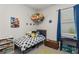 This bedroom offers space for books and toys at 13708 Old Creek Ct, Parrish, FL 34219