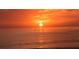 Beautiful sunset over the ocean, reflecting vibrant colors and creating a serene view at 1461 Porpoise Rd, Venice, FL 34293