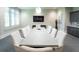 Well-appointed conference room with a large table, comfortable seating, and a modern design at 16904 Vardon Ter # 208, Lakewood Ranch, FL 34211