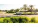 Community entrance sign set amongst a well manicured landscape on a beautiful sunny day at 16904 Vardon Ter # 208, Lakewood Ranch, FL 34211