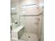 Bathroom featuring a glass shower, vanity, and neutral colors at 18008 Waterville Pl, Bradenton, FL 34202