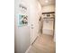Cozy entryway with custom decor, a bench, and a coat rack at 18008 Waterville Pl, Bradenton, FL 34202