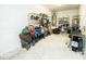 Spacious garage featuring ample storage, a water heater, and organization solutions at 18008 Waterville Pl, Bradenton, FL 34202