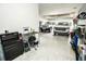Well-lit three car garage offers generous space for vehicles and storage at 18008 Waterville Pl, Bradenton, FL 34202