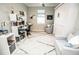 Spacious office with a built-in Murphy bed, desk, shelving, and stylish decor at 18008 Waterville Pl, Bradenton, FL 34202