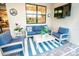Cozy covered patio with comfortable seating, perfect for enjoying the outdoor ambiance at 18008 Waterville Pl, Bradenton, FL 34202