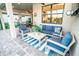 Cozy covered patio with comfortable seating, perfect for enjoying the outdoor ambiance at 18008 Waterville Pl, Bradenton, FL 34202