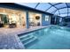 Inviting pool and patio area for outdoor relaxation and entertainment at 18008 Waterville Pl, Bradenton, FL 34202